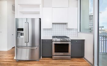 Kitchen with cabinets at Deca Apartments, Greenville, SC, 29601